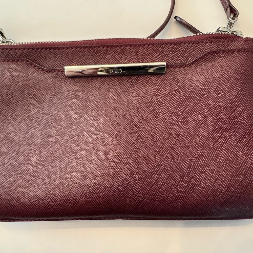 Authentic TUMI Burgundy Leather Clutch